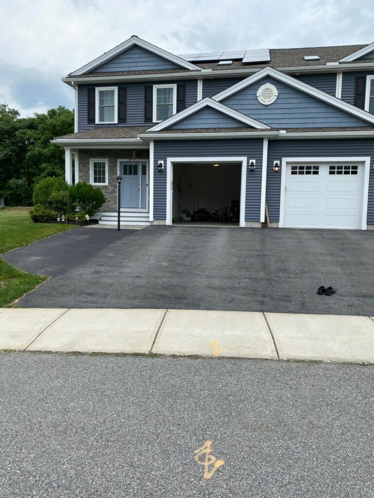 Driveway Crack Filling & Sealcoating in Woburn, Massachusetts - Before