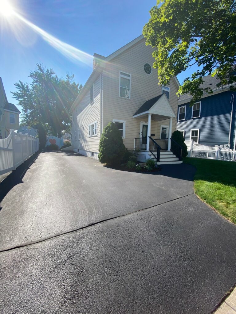 Driveways professionally seal coated in Medford, Massachusetts