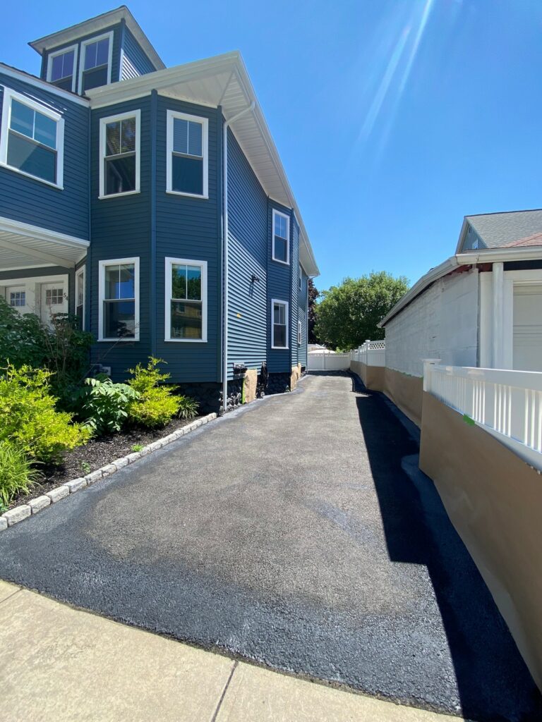 Driveways professionally seal coated in Medford, Massachusetts